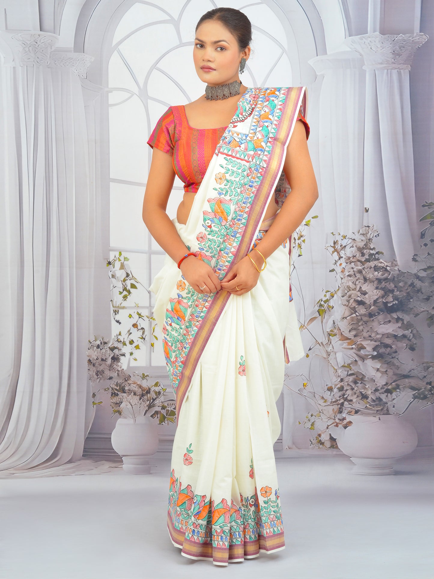 Floral Madhubani hand-painted Kerala cotton saree with maroon border