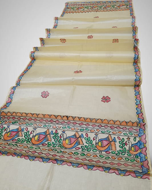 Pure Natural beige Madhubani Tussar silk stole showcasing colorful hand-painted borders of peacocks, fish, and temple geometric patterns