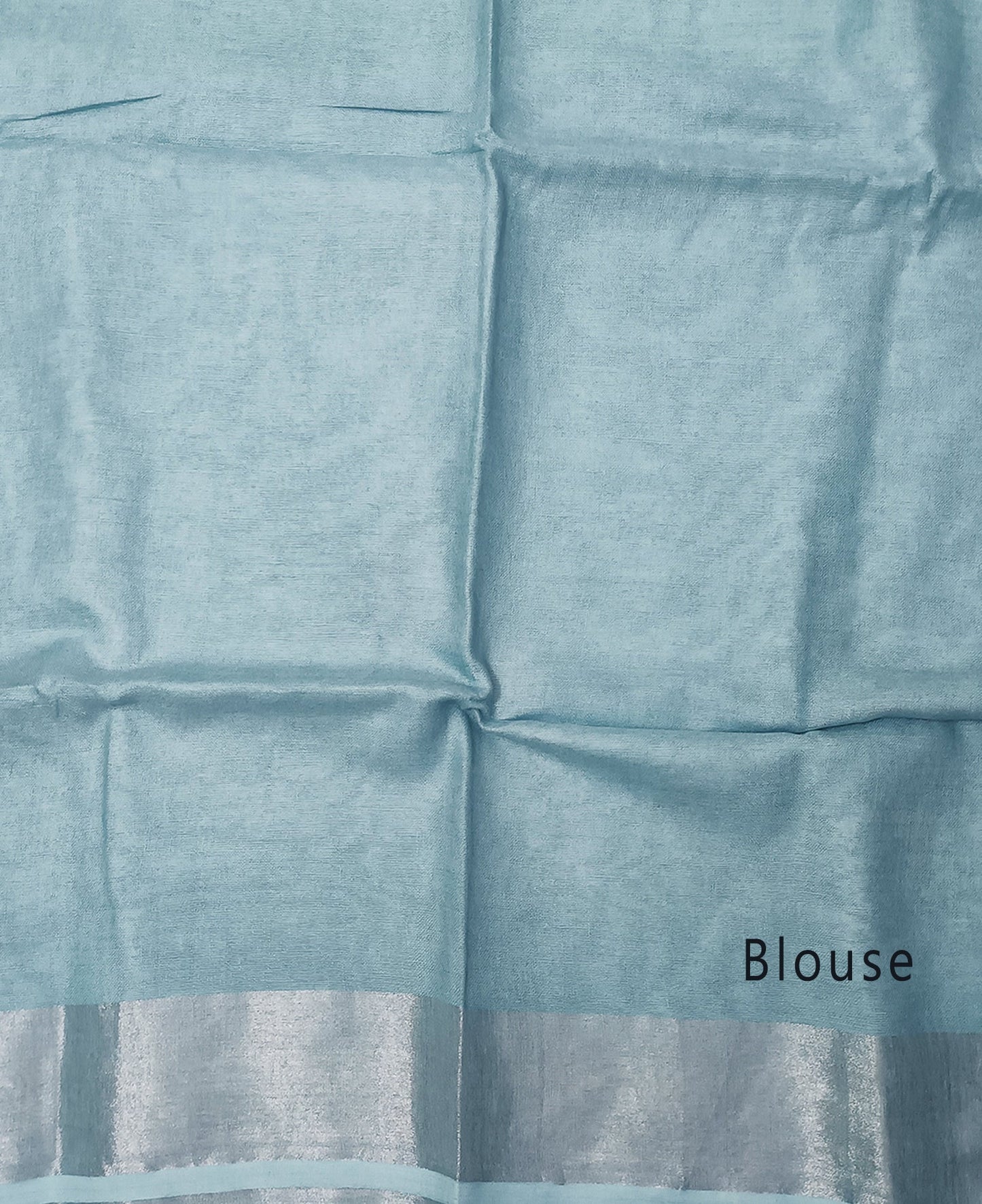 Serene Sky Blue Linen Saree with Classic Silver Zari Border and Tassel Details