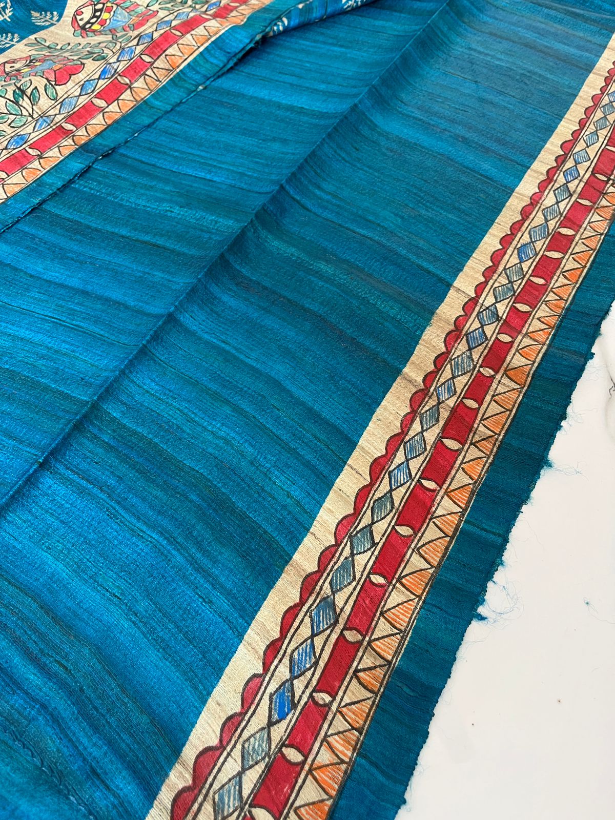 Neel Matsya Hand-Painted Madhubani Tussar Ghicha Silk Saree in Peacock Blue and Natural Gold