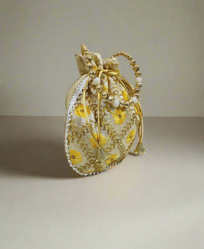 Barfi-Pattern Off-White Potli with Yellow Embroidery