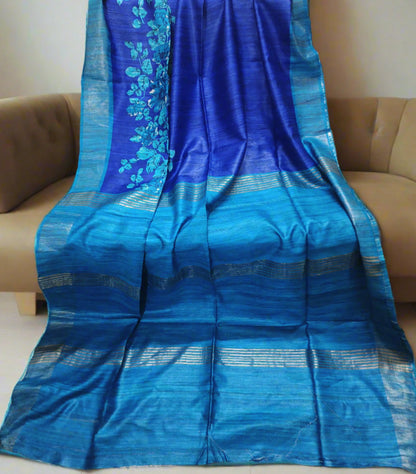 Blue Floral Printed Tussar Ghicha Silk Saree with Zari Border