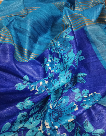 Blue Floral Printed Tussar Ghicha Silk Saree with Zari Border