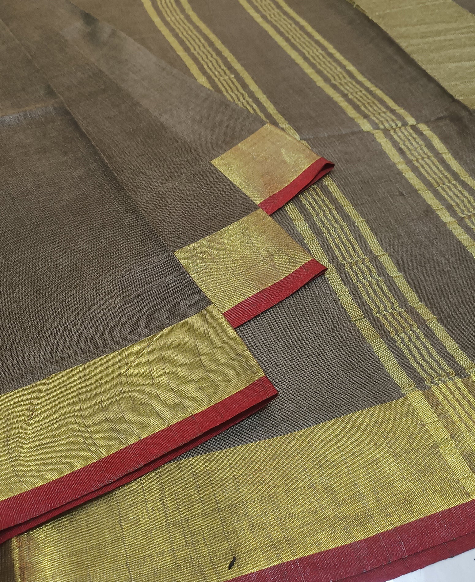 Earthy Brown Cotton Slub Saree with Golden Striped Pallu and Red Contrast Border