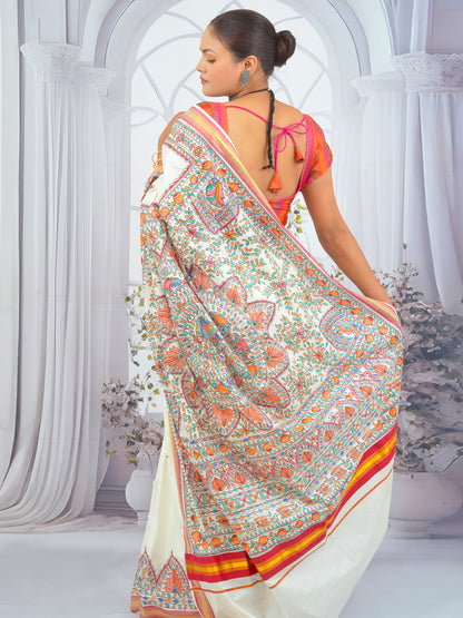 Model wearing Floral Madhubani Kerala Cotton Saree with Red Border
