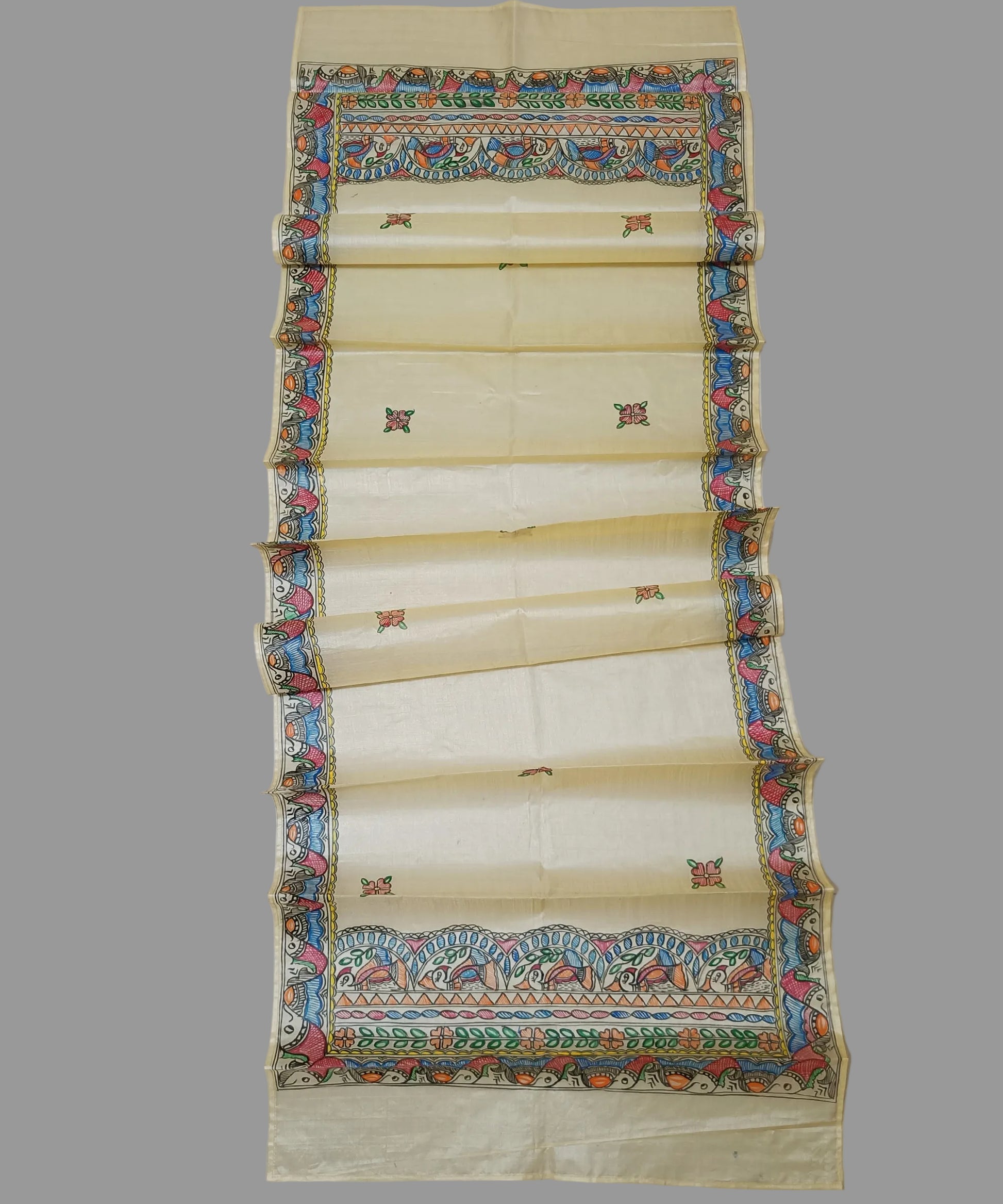 Natural cream Madhubani Tussar silk stole/scarf featuring an extensive border of colorful hand painted fish motifs and detailed panels of stylized birds