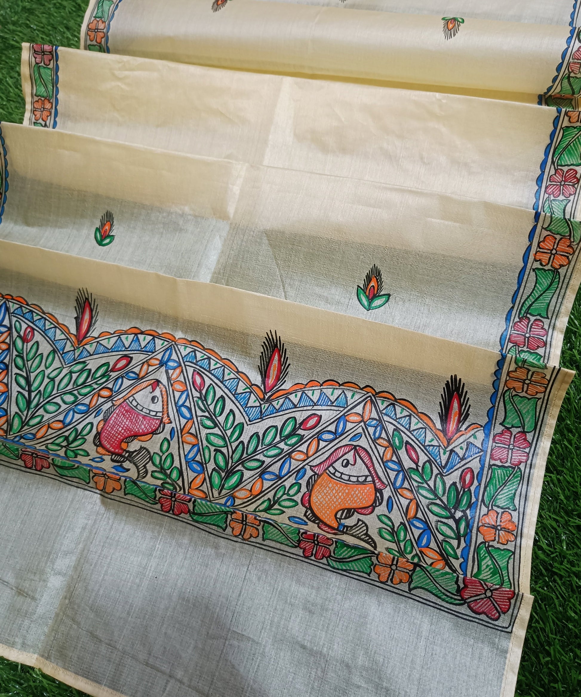 Pure Hand-painted Madhubani Tussar silk stole with colorful traditional fish and floral motifs on a natural cream background