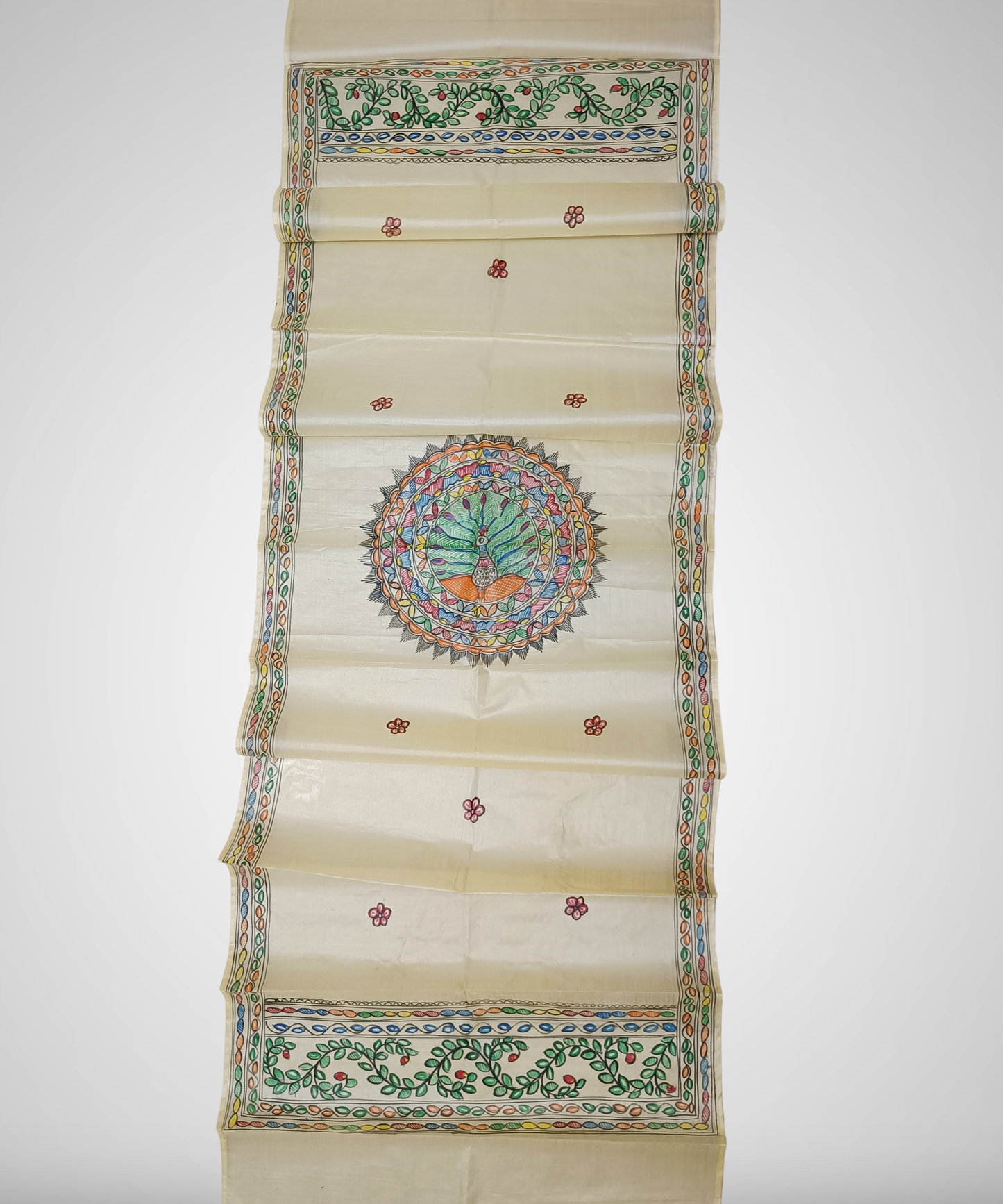 Hand painted Natural cream Madhubani Tussar silk stole featuring a colorful central circular peacock Motif and green leafy vine borders