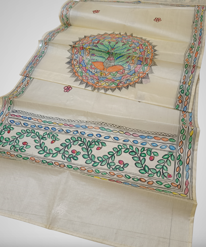 Natural cream Madhubani Tussar silk stole featuring a colorful central circular peacock mandala and green leafy vine borders