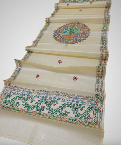 Natural cream Madhubani Tussar silk stole featuring a colorful central circular peacock mandala and green leafy vine borders