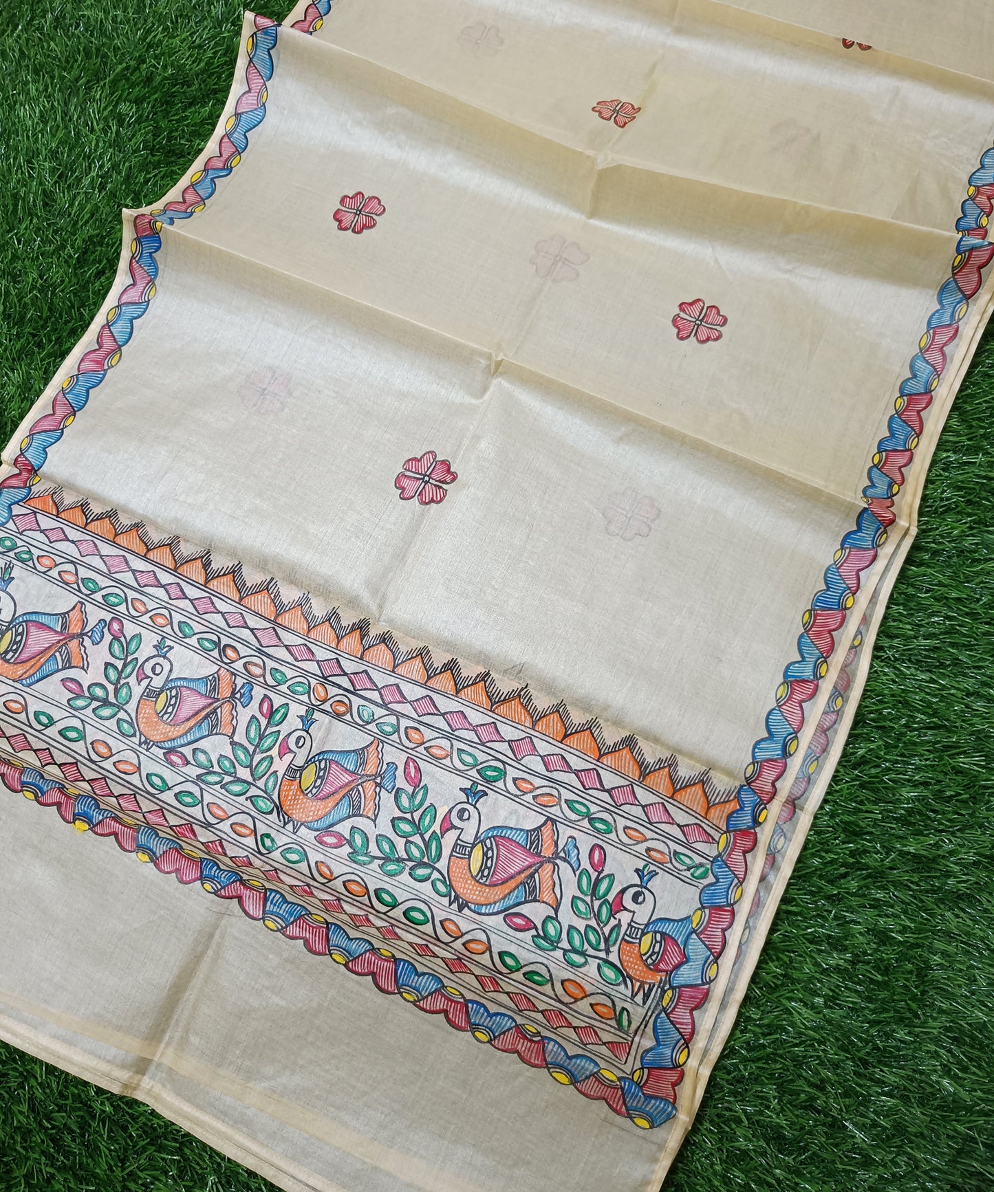 Natural beige Madhubani Tussar silk stole showcasing colorful hand-painted borders of peacocks, fish, and temple geometric patterns (Mithila Painting)