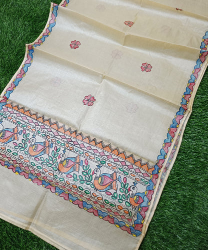 Natural beige Madhubani Tussar silk stole showcasing colorful hand-painted borders of peacocks, fish, and temple geometric patterns (Mithila Painting)