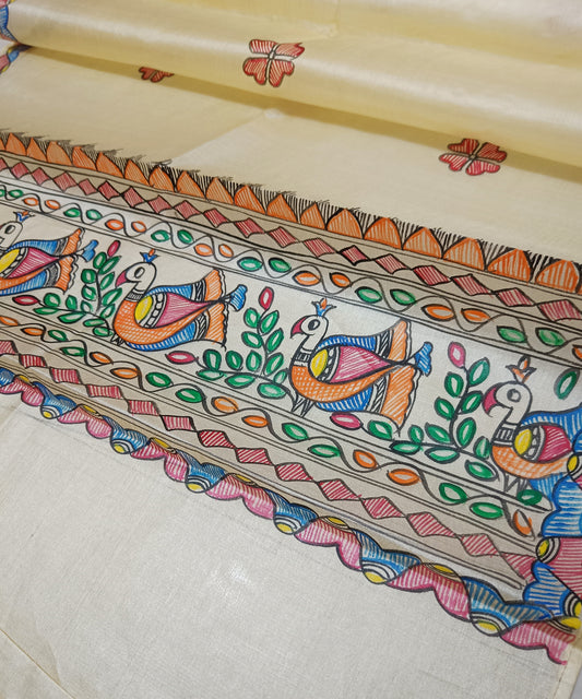 Natural beige Madhubani Tussar silk stole showcasing colorful hand-painted borders of peacocks, fish, and temple geometric patterns