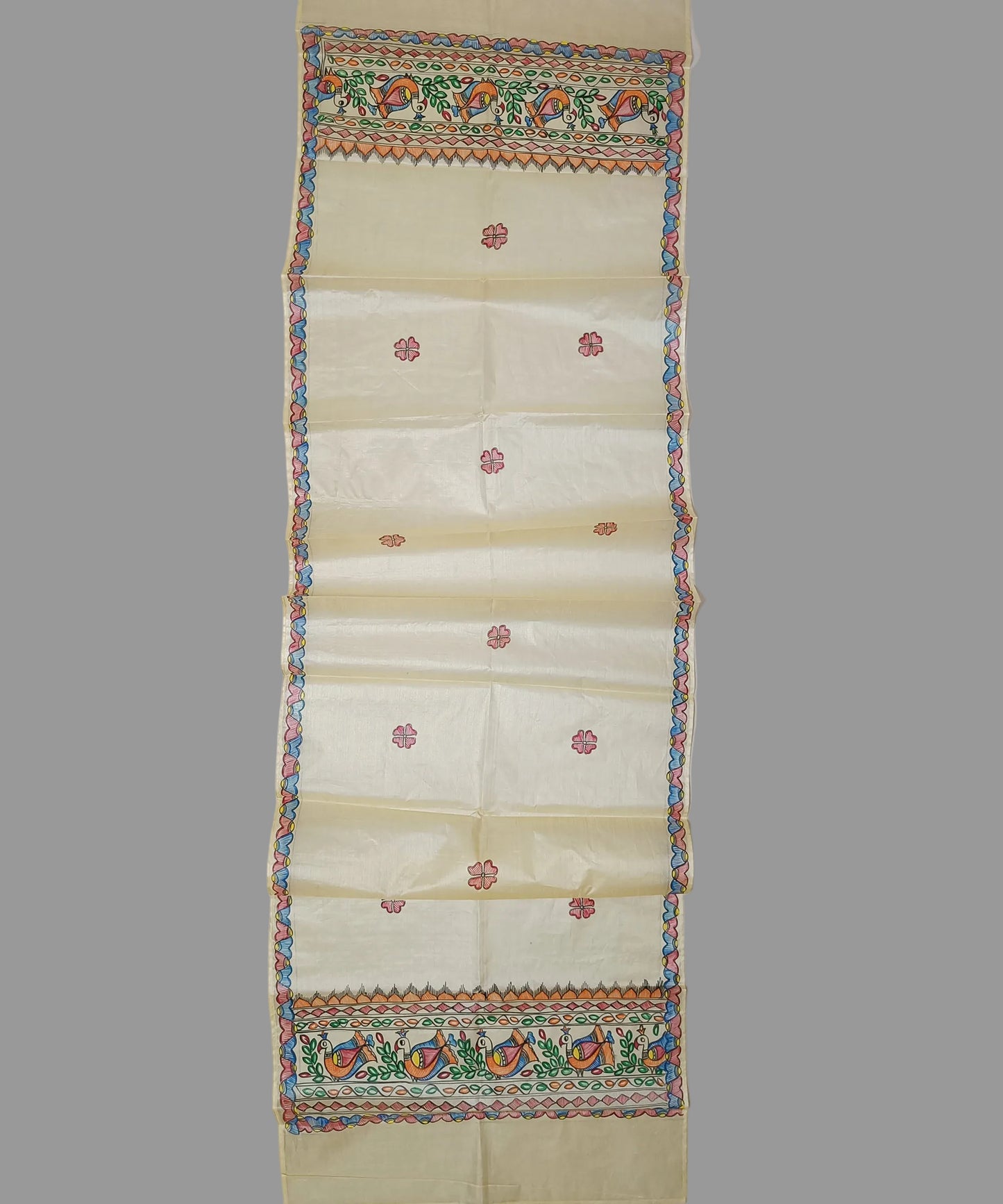 Pure Natural beige Madhubani Tussar silk stole showcasing colorful hand-painted borders of peacocks, fish, and temple geometric patterns