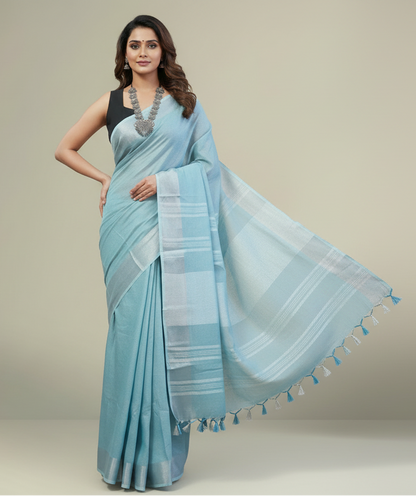 Serene Sky Blue Linen Saree with Classic Silver Zari Border and Tassel Details
