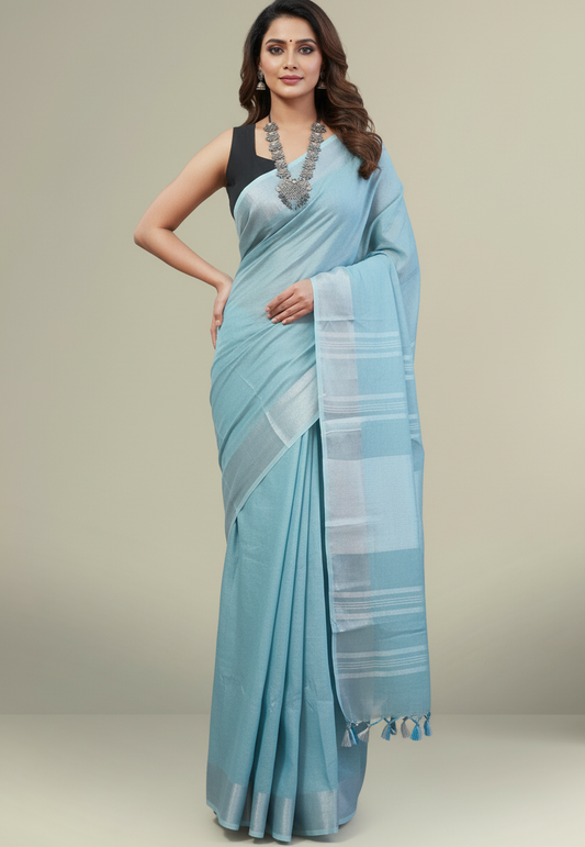 Serene Sky Blue Linen Saree with Classic Silver Zari Border and Tassel Details