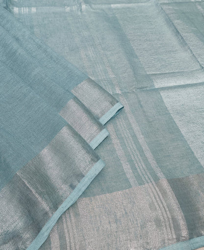 Serene Sky Blue Linen Saree with Classic Silver Zari Border and Tassel Details