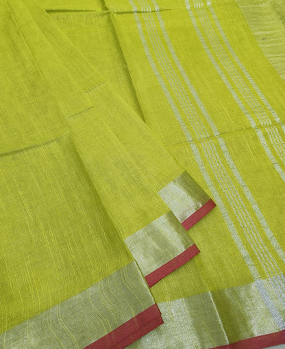 Vibrant Lemon Yellow Cotton Slub Saree with Silver Zari Pallu & Pink Tassels